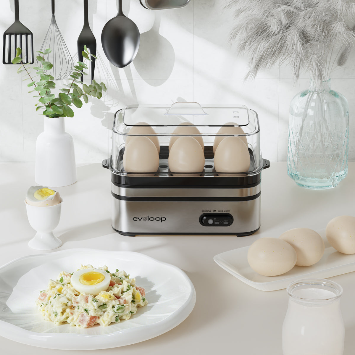 Evoloop egg cooker steaming eggs with steam rising